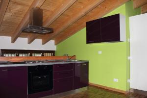 A kitchen or kitchenette at Maison d'Elite