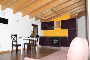 A kitchen or kitchenette at Maison d'Elite