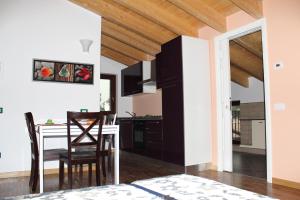 A kitchen or kitchenette at Maison d'Elite