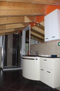 A kitchen or kitchenette at Maison d'Elite
