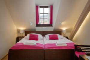 Posteľ alebo postele v izbe v ubytovaní Hotel Beskid