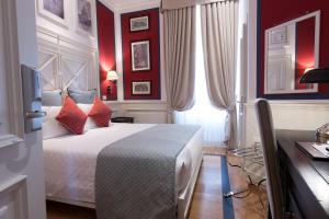 Posteľ alebo postele v izbe v ubytovaní Hotel Bologna ***S