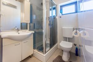 Kúpeľňa v ubytovaní Apartment Tus A2 + 33 fotografií