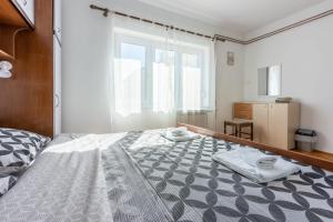 Posteľ alebo postele v izbe v ubytovaní Apartment Tus A2