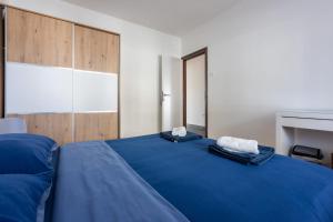 Posteľ alebo postele v izbe v ubytovaní Apartment Tus A2