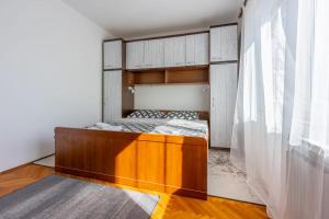 Posteľ alebo postele v izbe v ubytovaní Apartment Tus A2