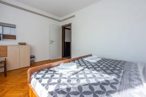 Posteľ alebo postele v izbe v ubytovaní Apartment Tus A2