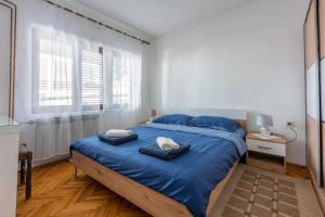 Posteľ alebo postele v izbe v ubytovaní Apartment Tus A2