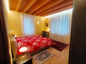 Letto o letti in una camera di Verona City Arsenale Apartment
