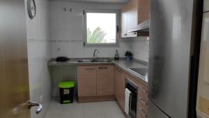 A kitchen or kitchenette at Alquiler Vacacional Salou W&S