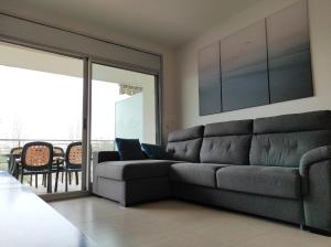 A seating area at Alquiler Vacacional Salou W&S