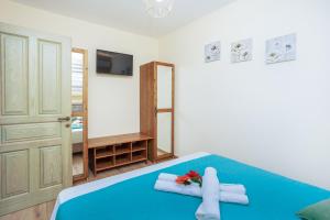 Postel nebo postele na pokoji v ubytování TwinStars Maisonette