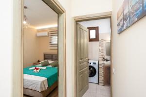 Postel nebo postele na pokoji v ubytování TwinStars Maisonette