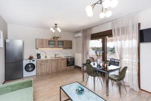 Kuchyň nebo kuchyňský kout v ubytování TwinStars Maisonette