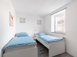 Tempat tidur dalam kamar di Comfortable apartment in Monschau H fen with private garden