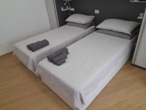 Posteľ alebo postele v izbe v ubytovaní TrustEverVito