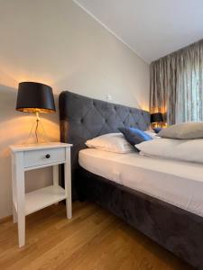 Łóżko lub łóżka w pokoju w obiekcie Apartman Yacht