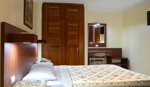 Rúm í herbergi á Hotel Castilla