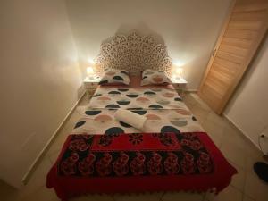 En eller flere senge i et værelse på Ti Kaz Marigot