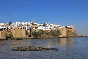 a town on the shore of a body of water at chambre priver in Rabat