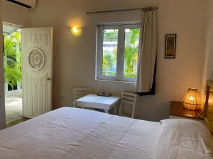 Postel nebo postele na pokoji v ubytování Hotel La Piazzetta
