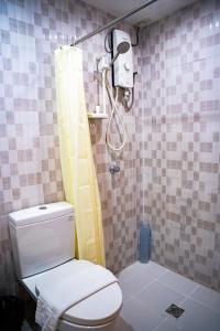 Ένα μπάνιο στο Chambre Hotel Mactan
