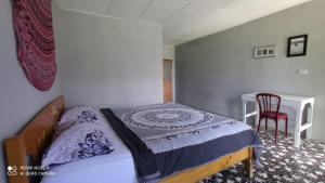 Leokap Homestay客房内的一张或多张床位