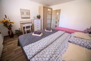 Letto o letti in una camera di Ubytování U Vávrů