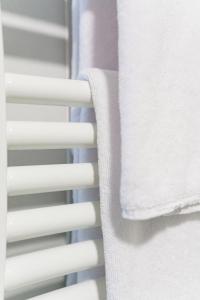 a close up of a window with towels on it at PENSIÓN CASA ELENA *** in Arzúa