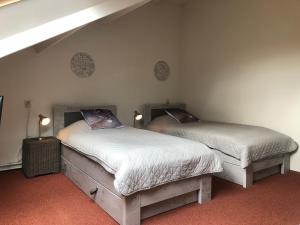 En eller flere senge i et værelse på Apartment Casa Di Mare