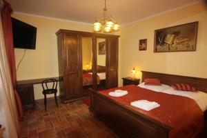 Voodi või voodid majutusasutuse Hotel Pelikán toas