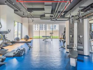 Fitness center at/o fitness facilities sa Art-inspired apartment amidst Downtown Dubai