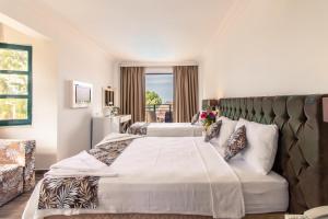 Postel nebo postele na pokoji v ubytování Bahar Hotels + 28 fotografií