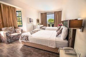 TV a/nebo společenská místnost v ubytování Bahar Hotels