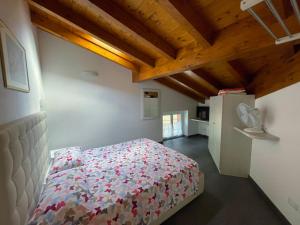 Кровать или кровати в номере Antica Residenza I Ronchi Di Bellagio