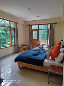 Postel nebo postele na pokoji v ubytování Getaway Stays Manali