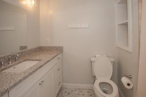 a bathroom with a toilet and a sink at Lazy Day-Z in Virginia Beach