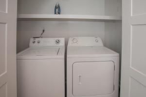 a white washer and dryer in a small kitchen at Lazy Day-Z in Virginia Beach