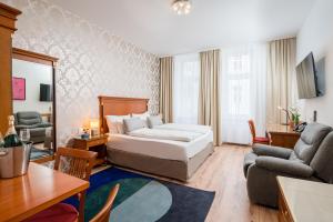 Posteľ alebo postele v izbe v ubytovaní Best Western Plus Celebrity Suites