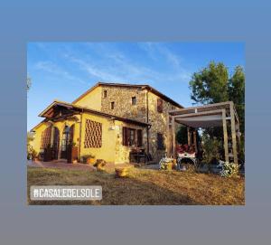 an old building with at Bed and Breakfast Casale del Sole in Castellina Marittima