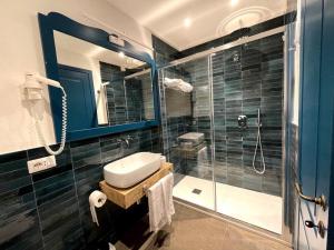 Ein Badezimmer in der Unterkunft Isolotto Guest House