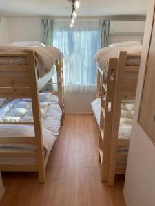 Un ou plusieurs lits superposés dans un hébergement de l'établissement Etranger Kaname Cho