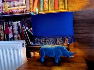 a blue toy rhino sitting on top of a table at Gabrielles in Blackpool