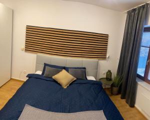 Posteľ alebo postele v izbe v ubytovaní Apartmán Lara