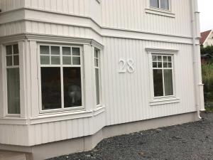 a house with a window with the number on it at Villa Klæboe in Bergen