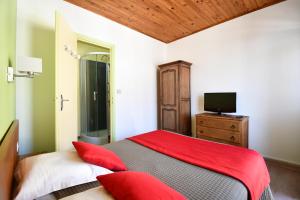 TV a/nebo společenská místnost v ubytování Hotel Fortin