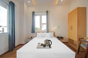 Příslušenství pro přípravu čaje a kávy v ubytování UPAR Hotels - T Nagar
