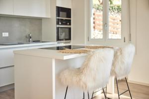 A kitchen or kitchenette at Villa Paier Relais & Pool