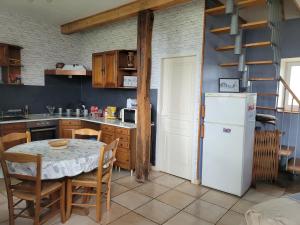 Kjøkken eller kjøkkenkrok på Le rossignol