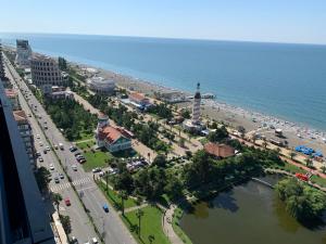 an aerial view of a beach and the ocean at Luxury Studio with Ocean View in Batumi